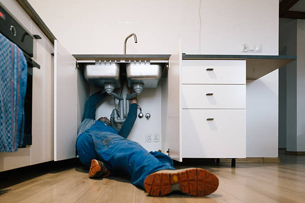 Professional Drain Cleaning technician working in Melrose, MA